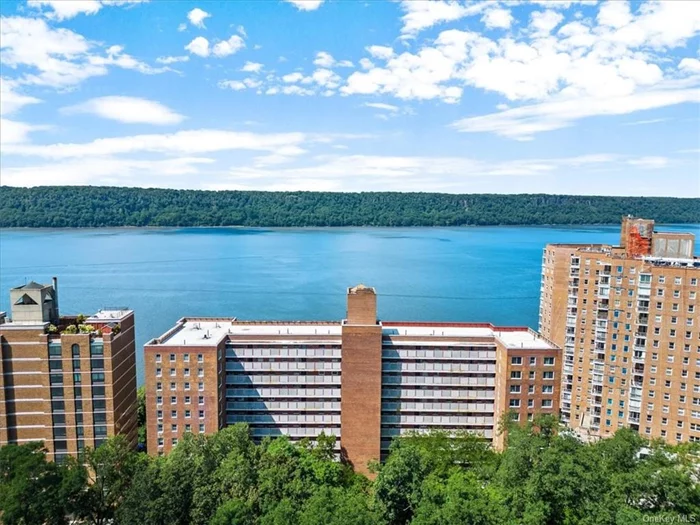 Riveredge Coop on the Majestic Hudson River Bank!: Mid-Century Hi-Rise on Hudson, 1958 construction. Enter the lobby with a vast array of Orchids, Mark Rothko prints adorn the lobby walls. Unit 2J is a 1 bedroom with upgraded kitchen, renovated bathroom. this unit enjoys east/west exposure. Riveredge offer wonderful amenities, doorman, live-in super, seasonal pool, gym, playroom/library/community room, storage lockers/cages, bike/ski racks, modern laundry room, heated garage. Easy access to Metro North RR, City/Express buses 1 block. Pets welcome -30lbs Wave Hill 1 mile, Riverdale Park, nature trails, New kiddies play park at Van Cortlandt Park , Golf, Equestrian center/Golf, cafes, Restaurants, Shopping, Schools, Tennis courts all within a short distance.