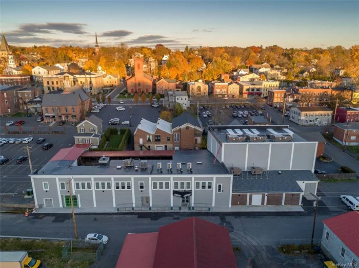 QUALIFIED PRODUCTION FACILITY with State-of-the-Art Studio + Sound Stage  Wedding & Event Space & Waterfront Development Opportunity Available in the Hudson Valley in Catskill, NY. 62 Water Street presents the rare and profitable opportunity to spur the renaissance of a town that&rsquo;s ready to blossom with your vision, with a potential nearly 150, 000&rsquo; mixed use development on the waterfront of Catskill Creek, a major tributary to the Hudson River Estuary. The fully operational production facility is its own revenue base and has been the filming studio for shows produced by Netflix, Apple TV, and HBO/Max. Offering: 20, 208 SF New Production Facility. 13, 450 SF Across Three Other Buildings 110, 818 SF of Air Rights. 1.06 Acre Waterfront Lot. Docking Stations Permitted. State-of-the-Art Qualified Production Facility. 450 Seated + 600 Standing Capacity. Sleeping accommodations for 24 People. One-Acre Flexible Waterfront Development Site. Elevator Available On-Site.