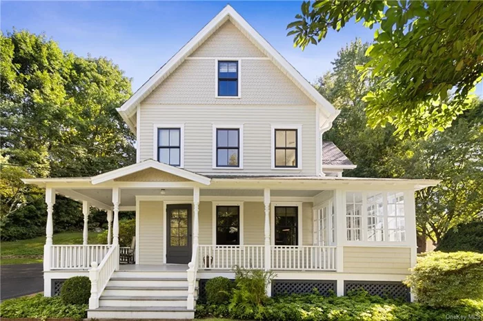 Village Victorian. Absolutely turn-key Victorian, circa 1906. Beautifully updated while retaining period details and charm. Nicely proportioned rooms with high ceilings, plaster walls, picture molding and hardwood floors. Rocking chair porch. Side hall Entry. Sun-filled Living Room. formal Dining Room with door to enclosed porch. Country Kitchen with marble counters, subway tile and stainless appliances. Two large Bedrooms with Walk-in Closets and one with doors to covered porch. Third Floor Bonus/Guest Room. Detached Two-Car Garage. Beautifully landscaped property convenient to everything. Walk to shops, train, library and elementary school! First time listed in years!