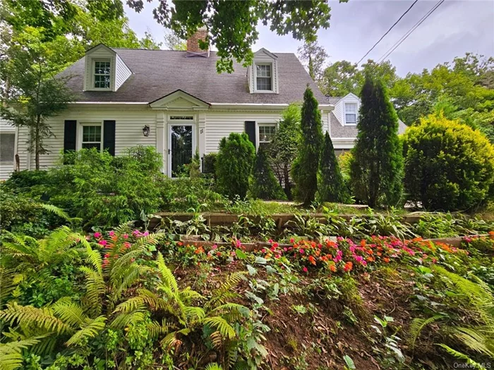 Just a short walk to North White Plains Metro North, this beautifully expanded Cape invites you into your very own private oasis. A welcoming foyer brings you to a spacious living room w/a sleek wood-burning fireplace, a charming enclosed 4-season porch and a formal dining room w/an open-concept kitchen w/stainless steel appliances and granite countertops. The kitchen and living room boast stunning views of the spectacular backyard, complete w/ a full outdoor kitchen, a covered kiosk, and other cozy settings to enjoy. The rocking chair porch is perfect for enjoying morning coffee and sunrise views. Behind the porch is a workspace that leads to the attached garage. 2nd level consists of the master suite w/2 full size closets, 2 smaller closets and a luxurious master bath, 2 bedrooms and an updated full bath. A new heating and cooling split system, ensures year-round comfort. Basement-open space and half bath. Driveway accommodates up to 6 cars. This exceptional property is a must-see!