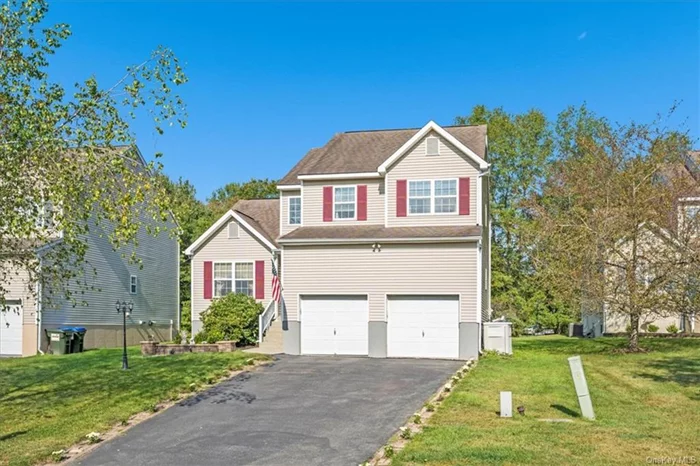 Welcome to this beautiful 2-story home that blends comfort and style! As you step inside, you&rsquo;ll be greeted by a sun-filled living and dining area with an open concept design, perfect for entertaining or relaxing. Brand new laminate flooring flows throughout the first floor, adding a sleek and contemporary touch. The main living area and stairs/hall has been freshly painted, making this home move-in ready! The kitchen features brand new quartz counters and eat-in-kitchen area with a slider to the deck. This premier lot offers lush and natural buffers with no neighbors in front or back. The master suite has cathedral ceiling, walk-in-closet and private full bathroom. Two additional bedrooms and a second full bath complete the upper level, providing plenty of space for all. The home also offers a 2-car garage with a loft for additional storage, ensuring ample room for your vehicles and belongings. Additionally, the full unfinished basement is spacious for all your storage needs with potential to expand your recreational area. Other amenities include an irrigation system, water softener and an energy-efficient Bosch tankless water heater. Located within the sought-after Washingtonville School District, this home also boasts a low HOA fee of just $60 per month, which covers lawn maintenance. Minutes from all major&#160;conveniences and highways, as well as Stewart Airport. Don&rsquo;t miss out on this opportunity to live in a wonderful community at an incredible value! *****Professional Photos To Follow*****