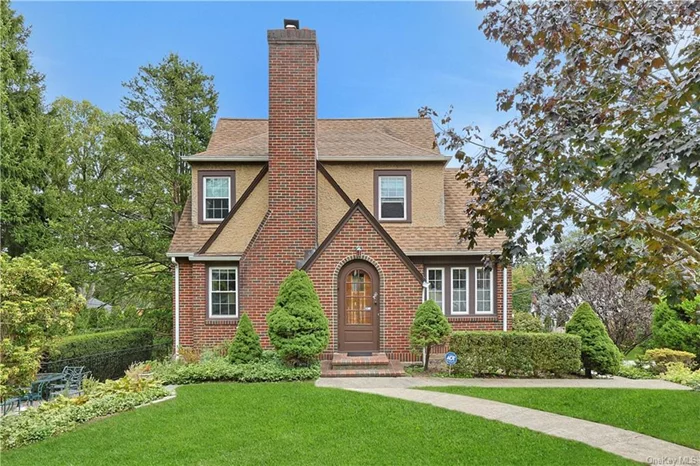 Who&rsquo;s ready to refresh the cutest Tudor in the world? Curb appeal, spacious lot, beautiful garden, attached garage, are all ready for you. As is an ideal location in quiet neighborhood just blocks from Hawthorne Elementary School. Inside, behold great bones- entry foyer, hardwood floors, cozy fireplace, bonus sunroom, formal dining room plus eat-in-kitchen, 3 bedrooms and 1 full bathroom upstairs, plus a stone patio, walk-up unfinished attic for storage, and a huge unfinished basement to grow into. Why share walls with neighbors when you can have your own house and yard? Bring your contractor and make this your home sweet home!