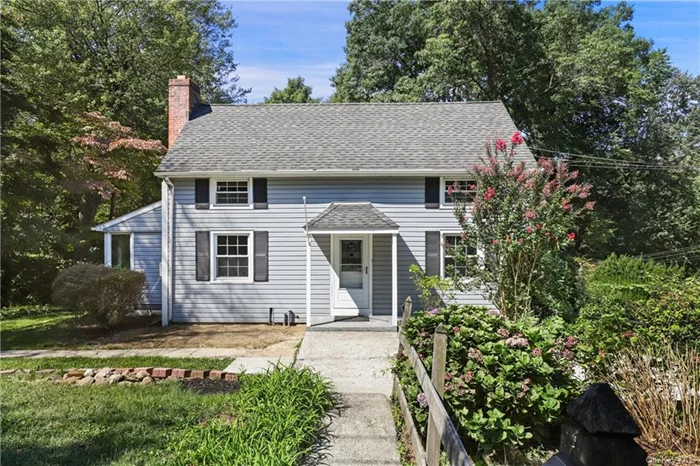 Possibilities abound for this prior-to-zoning two-family in a single family zone situated on a quiet dead end street. The main level features eat-in-kitchen, living room w/ woodburning fireplace, dining room, enclosed porch, full bath and bedroom. The top floor has a separate entry and includes kitchen, full bath, living room and bedroom. Hardwood floors throughout. Great set up for in-laws, as a mother/daughter or income generating. Privately set on nearly 1 acre, which might be subdividable. Driveway is accessible off a paper road. Convenient to shops, highways and schools.