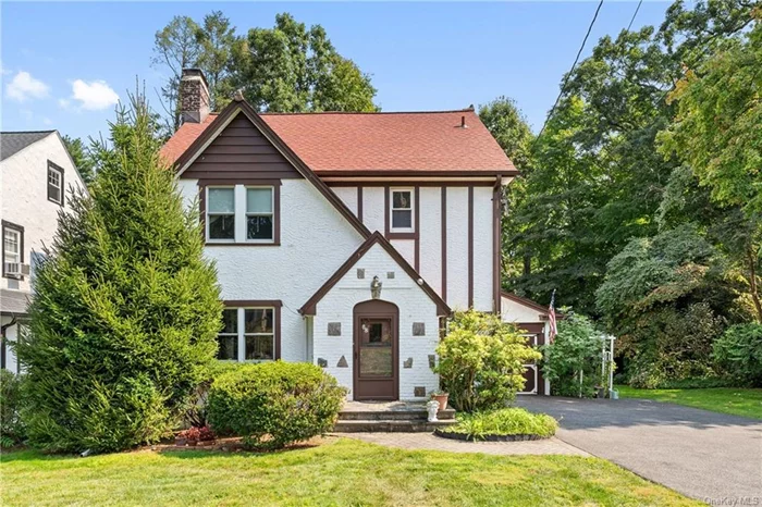 Picture perfect Tudor on a serene street in a spectacular location near schools, playground, fields, worship, pre-schools, bus to train, shops, restaurants & more! Enter through the foyer and experience the grand living room with fireplace, dining room, kitchen, spa room with whirlpool bath, and powder room/laundry. Upstairs, there are three bedrooms including a spacious primary bedroom suite with an ensuite bath and a full hall bath. The 3rd floor boats a potential bedroom, rec room area, and storage. French doors off the living room open to a private deck overlooking the beautifully landscaped property and plantings. The owners have lovingly maintained this home including a new roof in 2019. A rare opportunity to own a lovely home in the heart of Davis elementary close to all on a picturesque street at a compelling price!