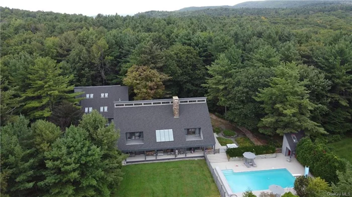 Berkshire/New York Contemporary Estate CHECK OUT VIRTUAL TOUR #2 6005 sf Main Home (3100 + 1516 + 1382 storage) + 5400sf Guest Residence on 20 private acres (3 lots) in Shaker Ridge. Soaring spaces and beautiful stone fireplaces, master suite w. fireplace, plus junior suite and third BR or studio with sink. Large kitchen with informal dining area & lounge with fireplace, plus, great room with stone fireplace, library and formal dining room, hardwood floors throughout, new roof, and geothermal heat + oil backup. Possibility of 1st floor Master. Guest Residence has workshop, 3 garage garage, endless pool and 2700sf 4BR3B living space. Also separate outdoor pool, indoor swim spa, outdoor jacuzzi, hot tub, zipline, & treehouse & access to community tennis & waste dropoff. Ideal for family compound, entertaining, work/residence. Ideal multigenerational family compound in the Berkshires.