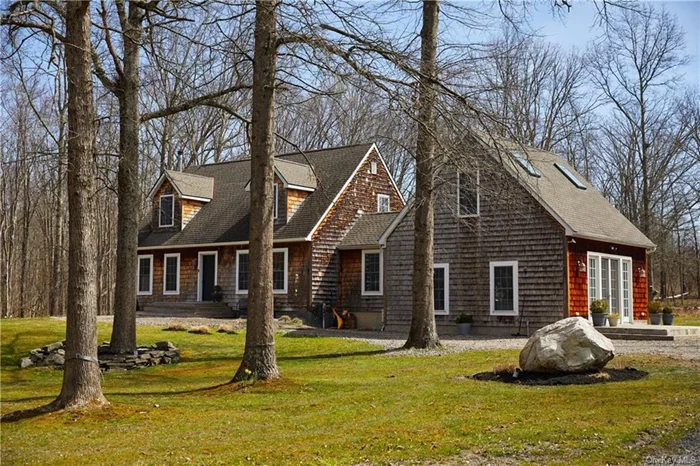 SPACIOUS + ELEGANT + RELAXED CAPE COD LOCATED IN THE ICONIC OUTLOOK FARM ENCLAVE JUST MINUTES FROM NEW PALTZ VILLAGE. Available for a full-year or more lease. This light-filled home is being offered fully furnished with sophisticated & artful furnishings, high-end appliances, professional Bertazzoni oven, stocked kitchenware, and a charmingly appointed library. The house and grounds suit luxurious full-time living and would also be perfect for weekenders and their guests. The layout is flexible: There are 3 bedrooms, with 2 being on the second floor and a majestic loft bedroom over the living room. Additionally, on the main level, there is a flex room with an adjacent bathroom that could serve as a bedroom; or alternately, could be used as a guest room, sitting room, or home office. An expansive and comfortable living room has radiant heated floors, a soaring wall for screening entertainment, and enough space to add one&rsquo;s own ping pong or pool table, for example. Custom bathrooms have heated towel racks and roomy vanities. Easy access to outdoor living and entertaining with a large private back deck and BBQ grill off the dining room, an additional stone patio directly off the living room, and generous flat land surrounding the house. Laundry room with a full-sized washer and dryer is conveniently located off the kitchen. Tenants have use of the pristine and brightly lit basement. Please note: the onsite garage is not being rented at this time. Located in New Paltz Central School district, near numerous Hudson Valley interests, state parks, trails, vineyards, and orchards. Just minutes drive to SUNY New Paltz, Mohonk Preserve, the Hudson Valley Rail Trail and the New Paltz Bus Station. Bus service travels efficiently throughout the day, and direct to NYC in 1 hr and 40 mins. ***