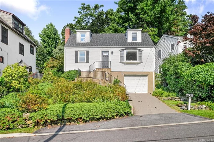 Charming Cape Cod in Ardsley School District - Move-In Ready! Welcome to this meticulously maintained 2 bed, 2 bath Cape Cod, located in one of the most desirable neighborhoods in the peaceful Village of Ardsley.  The first floor welcomes you with a spacious living room, complete with a large picture window that offers lovely views of the yard. The adjacent dining room and eat-in kitchen lead directly to a beautifully landscaped, enclosed private yard with a cozy patio perfect for gatherings or quiet relaxation.   Upstairs, you&rsquo;ll find two generous bedrooms and newly remodeled full bath. The finished lower level provides flexible space, ideal for a playroom, or a home office. This level also includes laundry, storage, utilities, and direct access to the garage.  Located within the highly-rated Ardsley School District and close to parks, shops, and public transportation, this home offers comfort, convenience, and charm. Don&rsquo;t miss this home. Schedule your appointment today.