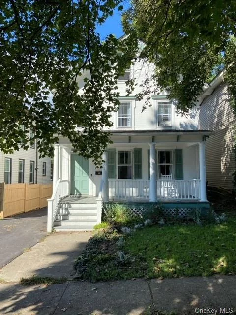 This charming and well-preserved 1880&rsquo;s colonial-style home boasts 3 bedrooms, 2 bathrooms, and beautiful original oak and pine hardwood floors. The recently renovated, spacious kitchen features stainless steel appliances and granite countertops. The home retains its character with elegant built-ins and French doors, reflecting its origins. In addition, enjoy time outside in the expansive, private backyard with a garden, and unwind on the charming rocking chair front porch. It is conveniently located in Poughkeepsie, near esteemed colleges, Metro North, Vassar Hospital, and more. Recent updates include a new Furnace (2018), kitchen and bathroom (2019), Driveway (2020), water heater (2023), Chimney lined (2024), some lighting fixtures, and several windows. Schedule your appointment today!