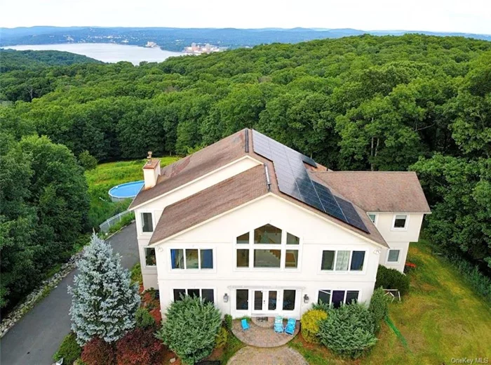 Breathtaking Mountain & River Views From This Custom Built Home With Walls Of Glass Bringing The Outside In To This SUN-Filled Entry. This Smart, Green Dwelling Situated On Top Of A Mountain, Surrounded By Over 5 Acres Of Private Forest Overlooking The Hudson River. Modern Colonial Architectural Design Through-Out. Expansive Chef&rsquo;s Kitchen, Over-Sized Great Room With Fireplace, Formal Dining Room, Private Guest Suite With Full Bath On Main Floor With Private Balcony. Huge Finished Walk-Out Basement. Exterior Offers Sauna, Shed , Hot Tub, Hot Sauna, Above Ground Pool, VIEWS, VIEWS, VIEWS