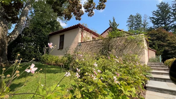 This Mediterranean masterpiece looks like it belongs nestled in the rugged landscape of Santa Barbara, but this gem is located in the heart of the Village of Pleasantville.The loggia, the shalllow open aired porch, welcomes you into this classy home! It&rsquo;s a private sanctuary with a gated entry, terracotta roof, tiled floor and lovely plantings.You will be surrounded by beauty! When you enter the house the large living room with fireplace, wood floors, lots of windows and arches, will take your breath away! Step into the oversized family room with a picture window that overlooks the backyard oasis. Peace and privacy abound in this special space. The bedrooms are tucked away from the main living space, which offers a quiet sanctuary. This house affords one floor of easy living and is just steps away from all things Pleasantville-the award winning schools, train, restaurants and Burns Film Center. It is a rarity when a home like this comes to market. You will be proud to call it home!