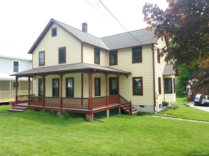 Better than new Side Hall Colonial with wrap around porch, lovingly renovated & upgraded thoroughly with an addition, featuring sitting room/ parlor, pocket doors, Bay window, and cherry hard wood floors. Original woodwork and trim have been refinished. Owners have upgraded electrical and plumbing systems as well as insulation and upgraded windows. Additionally C/A, upgraded natural gas fired boiler heating system has been added. This home offers a double lot and detached 2 car/ Garage/ Barn & professional Workshop WITH 220 v POWER. Double lot is partially fenced with beautiful perennial gardens and plantings.  Convenient proximity to the town pool, Highland Mills town park & beach. Thruway entrance, Harriman Railway Station & Metro North to NYC, only a few miles south near the Woodbury Commons shopping center. Harriman State Park, offers numerous lakes and hiking trails for all. Various stores, services & numerous food shopping centers are also conveniently located in the area.