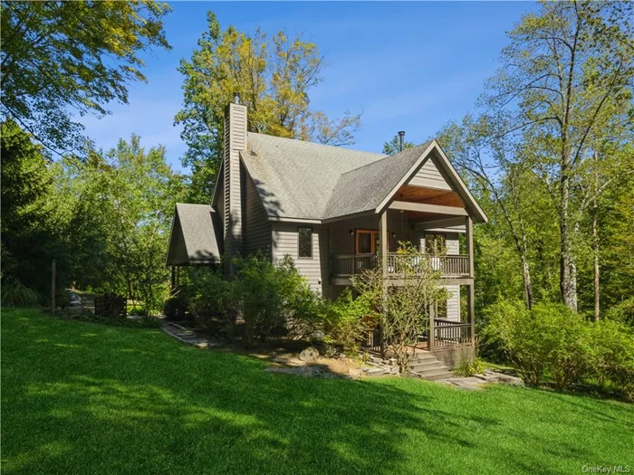 Be eye-to-eye with the treetops and enjoy the dance of light in this exquisite, architect-designed contemporary in Alligerville. It is privately sited on a quiet and desirable country road close to the hamlets of High Falls, Stone Ridge and Accord. While nature&rsquo;s beauty is in your back yard on this 8.5-acre parcel, you also enjoy close proximity to the Mohonk Preserve, Minnewaska State Park and countless Hudson/Rondout Valley attractions. Creative design of light-drenched living spaces on three levels featuring inviting openness and offering places for a private retreat and reflection. The top-level great room with tall cathedral ceilings and wraparound Pella windows that invite the visual charm of the serene surroundings regardless of the time of day or year. Refinished maple flooring is accentuated by polished slate tiles, and a wood-burning stove that is the warm heart of this room. Entertaining is a breeze in the open kitchen with an island/breakfast bar, beautiful maple wood cabinetry and natural stone counters. The dining room flows seamlessly into the living area, extended by a South-facing covered teak deck. Up a ladder is a cozy loft with two windows, the perfect place for a good read. A powder room and good storage complete the picture on this floor. A flight of stairs down, via the entrance foyer by the large front porch, you will find the primary suite with a dedicated morning brew porch and a spa-like bathroom with a large soaking tub. A second bedroom and a family room with an additional full bath with a walk-in shower. The walk-out lower level features about 500 sq ft of flex space with radiant heat, suitable as private guest quarters, studio, or office, with another stylish full bath with a polished slate walk-in shower. There is a large Trex deck off this space, and a separate entrance. Also on this level, a hidden wine cellar and a walk-out workshop, storage, and laundry room. Gorgeous bluestone walls and walkways, open lawns, mature woods and the meandering stream make the acreage diverse and so appealing. There is a fantastic opportunity to tie in the lightly wooded forest and make it your very own park-like sanctuary with stream-side trails and more places to sit and ponder!