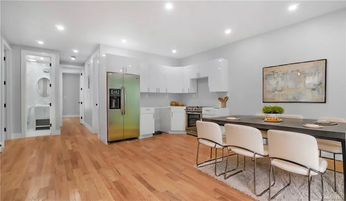 Beautiful fully renovated legal 2 fam det 6 bedroom 5 baths 2 balconies finished basement apartment, kitchen with stunning white kitchen cabinets stainless steel appliances and granite countertop.