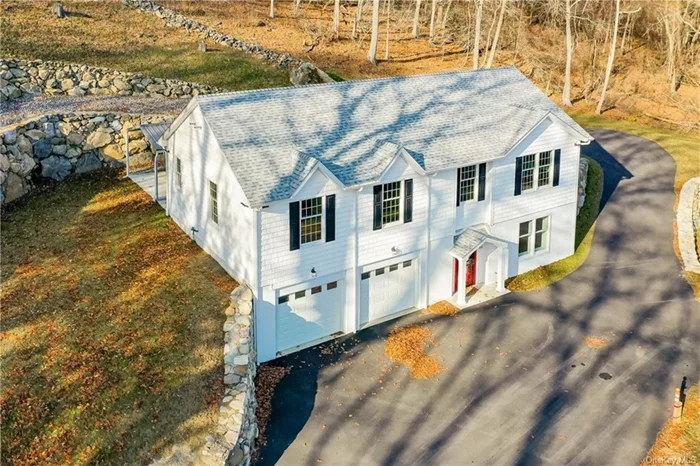 This stunning home is brand new from Westchester modular, built with top-of-the-line finishes and quality materials. As soon as you step inside, you&rsquo;ll be greeted by a bright and airy open floor plan that creates a spacious and inviting atmosphere. The chef&rsquo;s kitchen is a standout feature, featuring an oversized island with a prep sink and high-end appliances that are sure to appeal to the modern buyer. The 9+ foot ceilings on both levels add to the grandeur of the home. The master suite is a luxurious retreat, complete with a separate tub, dual sinks, and a shower. Walk-in closets provide ample storage space. The entire home is designed with energy efficiency in mind, ensuring lower utility bills and a smaller carbon footprint. The home boasts a 400 amp service, making it well-equipped for all your electrical needs. The garage is wired for level 2 240V electric car chargers, offering convenience for electric vehicle owners. Additionally, an automatic 32kw Generac commercial-grade generator provides peace of mind during power outages. For optimal comfort, the house features separate high-efficiency HVAC systems and Mitsubishi split systems. A heat ex changer system is also included, details of which can be found in the attached documents. Outside, the home is surrounded by sprawling exterior stone walls, adding to its curb appeal. There is a covered area at the rear of the home, perfect for kennels or future outdoor recreation space or hardscape. The private setting and ease of maintenance make this home a must-see. Located in the desirable southern Dutchess area, this home offers easy access to amenities and transportation. With just a 90-minute drive to NYC, you can enjoy the best of both worlds - a peaceful retreat and the excitement of the city within reach.