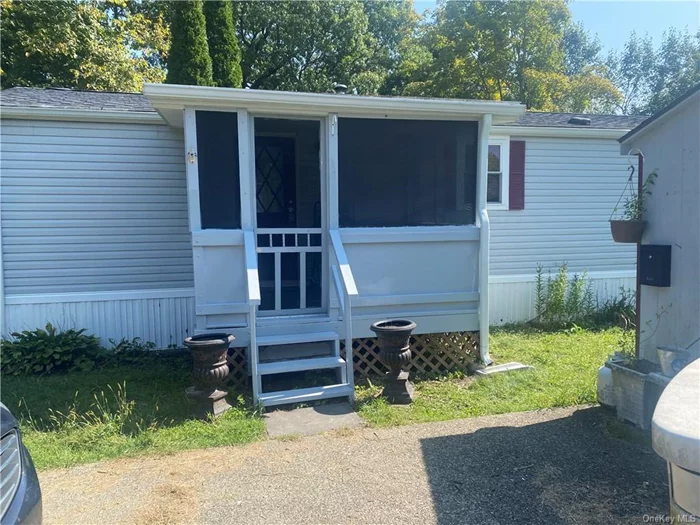 Welcome to 116 New Road, Lot #2, a beautifully maintained 2-bedroom, 2-bath mobile home in Milton, NY, available for rent which includes utilities as well as trash pick up. This charming home features a large master bedroom with a recently renovated ensuite bathroom, including a spacious stall shower. The updated eat-in kitchen offers ample cabinet space and upgraded appliances, perfect for meal prep and dining. The open-concept living room is bright and welcoming, with natural light flooding in through skylights, and leads to a screened-in porch ideal for relaxing in any weather. Additional highlights include a brand new hot water heater, parking for 2-3 cars with driveways on both sides of the home, and plenty of natural light throughout. Don&rsquo;t miss the chance to make this private home your own space! Nestled in a quiet location close to shopping and local amenities.