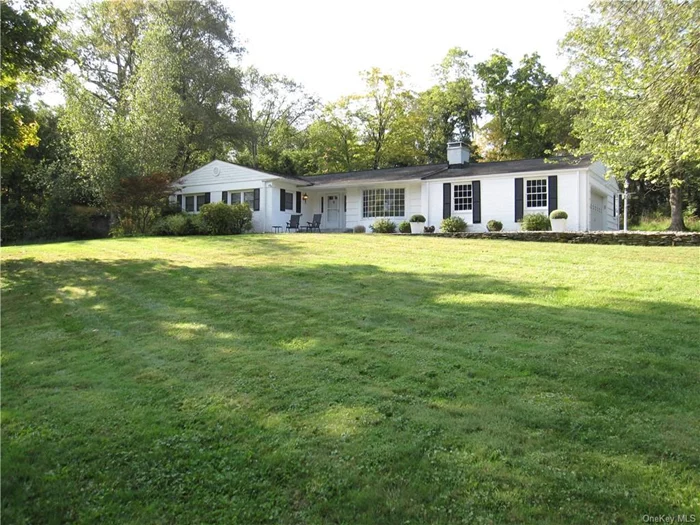 Beautiful and private one level ranch home on over an acre of property close to Town of Hopewell Junction and Taconic parkway for easy commuter access. This home features Living room with bay window and fireplace and large slider to three season room, dining room with built in cabinets, Primary bedroom with two walk in closets and primary bath, two additional bedrooms all with hardwood floors. Enjoy the light and bright three season room with attached office or possible fourth bedroom. Other features include whole house generator, new central air conditioning unit, new boiler, stone walkways and back patio all overlooking private yard and old existing barn.