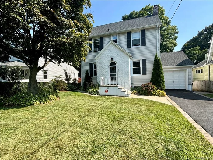 Location...location...location... Storybook Colonial situated just a few blocks to North White Plains Train Station. Beautifully updated home featuring hardwood floors throughout. Sundrenched Living Room with wood burning fireplace that leads into the formal Dining Room providing a perfect layout for entertaining. Updated Kitchen w/ stainless steel appliances and quartz countertops with backdoor that leads to a beautiful trex deck, level fenced in yard and patio. The second floor boasts a Large Primary Bedroom, 2 additional Bedrooms, an updated Full Bath and walk up attic. Close proximity to vibrant downtown White Plains, shopping, parks, recreation and all major highways. Commuter Dream! 35 minute Express to GCT.