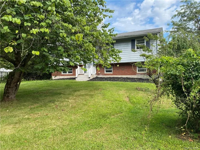 Renovated and move in ready. This four-bedroom spacious Raised Ranch has been refurbished with many new features, from appliances, new baths, furnace to electrical upgrades. There is little to do here but personalize to your comfort. The foyer entry stairs lead up to a spacious living room with an open floorplan. Attractive kitchen cabinetry with Corian counter tops overlooks the dining area with slider to a large screened in porch. Three bedrooms on this this level with good closet space. On the lower level, wow, an expansive family room with a half bath and laundry area. Down the hall is a private very good-sized bedroom/office/hobby room. Access from garage to interior. Conveniently located. You are in, now, visualize, personalize. Schedule your viewing today.