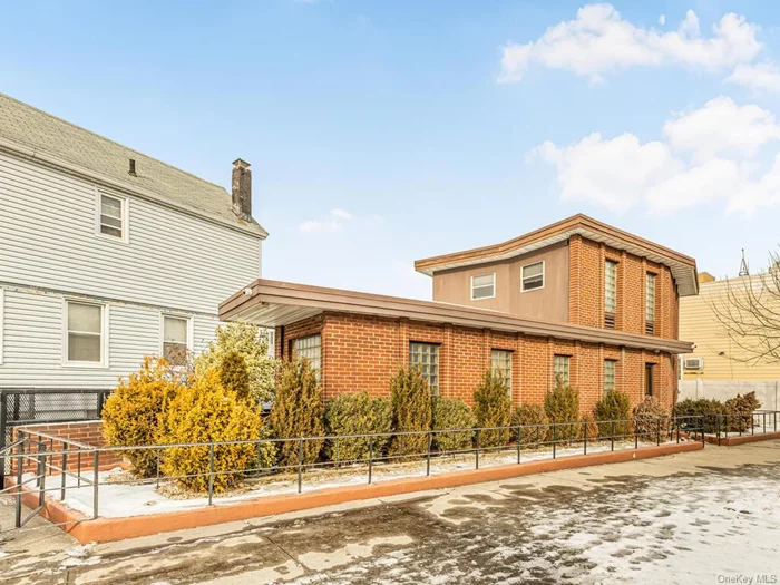 Welcome to this unique mid-century modern brick house in the heart of Maspeth. When you enter the main floor, to the left are the cozy living room and dining area. Heading to the right past the staircase is the kitchen with new stainless appliances, a breakfast nook, and a powder room. On the second floor are the main and second bedrooms and the full bathroom (toilet/tub/shower). The full basement was remodeled in 2021 to create extra rooms. This property comes with a one-car garage and a concrete driveway. This is in a very convenient location for both commuters and those who drive- it is close to bus and train stations and to major highways, walking distance to schools, restaurants and shops. The property is being sold AS-IS. Do not miss the chance to own this charming one-of-a-kind home!