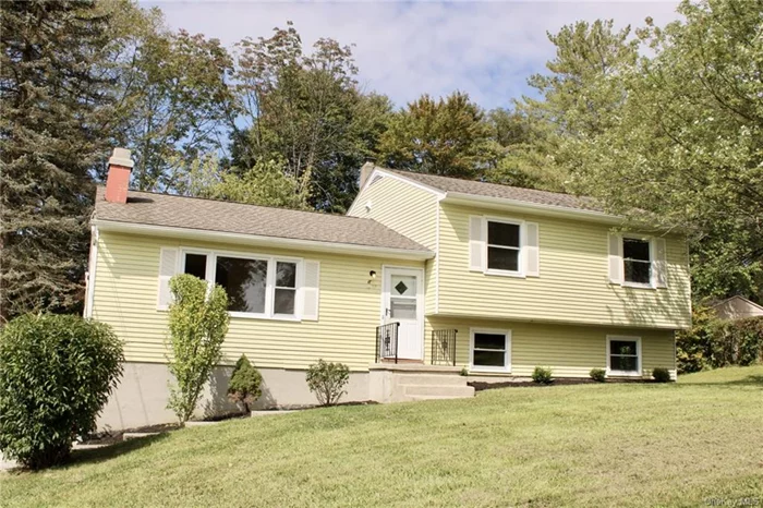 This charming 4 Bedroom, 1.5 Bath split-level home is all ready for you! Located on a generous half-acre lot in the Town of LaGrange, in the desirable Arlington School District. The light-filled rooms highlight the recently refinished hardwood floors and the freshly painted walls. The main level features an eat-in kitchen, a living room complete with a brick fireplace, and a dining room with French doors leading out to the deck and peaceful backyard setting. Upstairs there are 3 spacious bedrooms and a full bath with a combination tub/shower. The lower level includes the 4th bedroom, a bonus room which would be ideal for work or hobbies, and a half bath with laundry area. You will love the convenience of the two-car attached garage, whether to protect your cars from the elements or for extra storage!