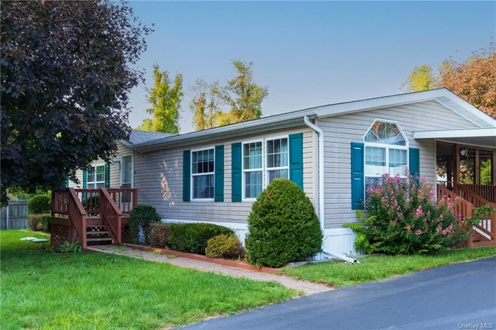 This 2001 manufactured mobile home has a delightful screened in porch with sliders into the dining room. The double wide offers 3 full bedrooms, 2 baths, light filled eat in kitchen, dining room, spacious living room and a laundry room. . Located near the end of the lane there is a nice front and back yard, car port and shed in this 55 and over mobile home park, located in between the Villages of Rhinebeck and Red Hook.