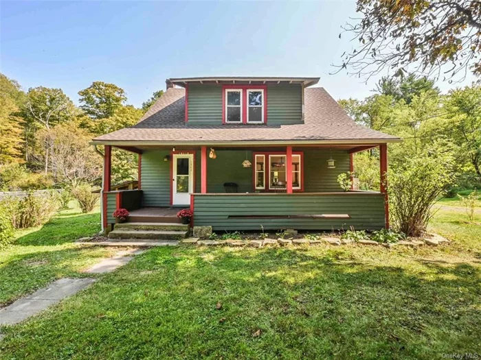 This 1940s Arts and Crafts-style home is brimming with charm and character, nestled on a serene 1-acre lot on a quiet road in Ulster Park just minutes to Kingston, Rosendale and New Paltz. Featuring 3 cozy bedrooms, 1 bathroom, living room, dining room, and an eat-in country kitchen, this home has a warm and rustic appeal. An enclosed back porch could make a great mudroom or a space to add another bathroom. The covered front porch is the perfect place to hang during a rain storm or to wind down in your rocking chair... Recent updates include solar panels that nearly eliminate the electric bill, a highly efficient electric boiler for heating and hot water, new roof, interior and exterior paint, new plumbing, septic tank, a UV water filtration system, water softener, and a sump pump. Much of the home has new windows, and the electrical panel has been updated to 200amp. *Calling for Highest and Best by Monday 9/30 at Noon*