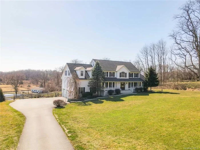 HUDSON VALLEY HORSE FARM in Chester, NY with award winning Goshen Schools. Expansive and dramatic views of farm situated on 30 acres with 5 huge paddocks, two with run in sheds. A spacious 7 stall horse barn with tack room and center aisle, professionally installed sand riding arena, water spigots at paddocks, fenced in back yard overlooking an idyllic pond with pump and filtration. Imagine gazing out back at the horses, the sparkling pond and spectacular views from your the deck of your expansive modern colonial home with huge deck. In addition to 3600 square feet of primary living space, this welcoming home offers a full 1200 sf walk out basement with full bath, second kitchen and office. The best part of this house is the sunny light filled rooms the every changing views and sense of peace. Plenty of room for ATVs, snow mobiles, snowshoeing and hobbies in general. Just minutes to major highways (I-86/Route 17), Woodbury Common, Lego Land, hospitals, schools and public transportation to NYC. This is a special opportunity!