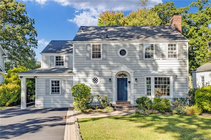 Experience luxury in this stunning 5-bedroom, 5-bath Colonial located on the picturesque Pelham Country Club golf course. Renovated and expanded, this home offers an unparalleled lifestyle with breathtaking views, providing the perfect backdrop for outdoor relaxation and entertaining. The gracious foyer opens to a formal living room with a wood-burning fireplace and a formal dining room leading to a modern eat-in kitchen. The kitchen features high-end appliances, a center island, and an open flow to the family room with vaulted ceilings and skylights, maximizing views of the backyard. The family room also provides access to a charming covered Trex deck with steps down to a generous Bluestone patio, ideal for enjoying the spectacular sunrises. Additionally, the first floor includes a bedroom, full bath, walk-in pantry, laundry room, and mudroom for added flexibility and convenience. Upstairs, the light-filled primary suite includes an ensuite bath. Three additional bedrooms and two more full baths, one with a double vanity, complete this living level. The lower level features over 1, 000 square feet of finished, flexible space not included in the square footage, including a recreation room with access to the Bluestone patio and backyard, a family room, full bath, and plenty of storage, including a workshop/shed with outdoor access for bike and equipment storage. This home is just steps away from Shore Park, bike paths, and Prospect Hill School, and is convenient to shopping and restaurants. Additionally, it is under 30 minutes from Grand Central via Metro-North, making it a move-in-ready home that combines tranquility with accessibility. It offers spectacular views and an ideal retreat to enjoy all of the amenities Pelham offers.