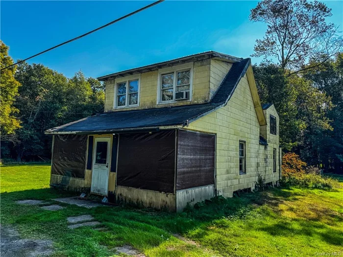 This four-bedroom farmhouse, situated on 2 acres in Monticello, offers a blank canvas for restoration and is ideal for those seeking a fixer-upper with great potential. While the home is well-built, it is in need of a new roof and has active leaks in some areas. The well and septic are believed to be in good condition, adding to the home&rsquo;s practicality. Conveniently located near popular attractions such as Resorts World Catskills, Kartrite Indoor Waterpark & Resort, YO1 Wellness Center, and Holiday Mountain Ski Resort, this property offers both privacy and easy access to a variety of amenities. With a little TLC, this farmhouse could become a charming retreat in the heart of the Catskills. Cash or renovation loans only. *Basement has water come in with heavy rain, sump pump in place. Roof in need of replacement, leaks in kitchen area and bedrooms upstairs. Mold may be present, wear mask and enter at own risk. Hold harmless must be signed by all parties entering prior to confirmed appointment.*