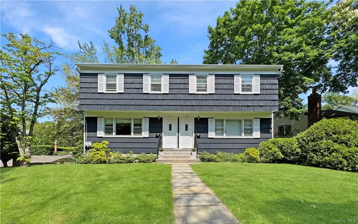 Refreshed and revitalized! Bright and spacious 3br /2.5 bath townhouse with hardwood floors, private deck and private garage. Freshly painted interior & exterior and new heating system 2022. Complete renovation has been made to the second floor hall bathroom. Oversized, top shelf kitchen with granite counters and stainless steel fridge plus dishwasher and range. New dishwasher was installed in 2023. Large unfinished walkout basement with private laundry. Beautiful curb appeal on quiet neighborhood street. Walk to all.