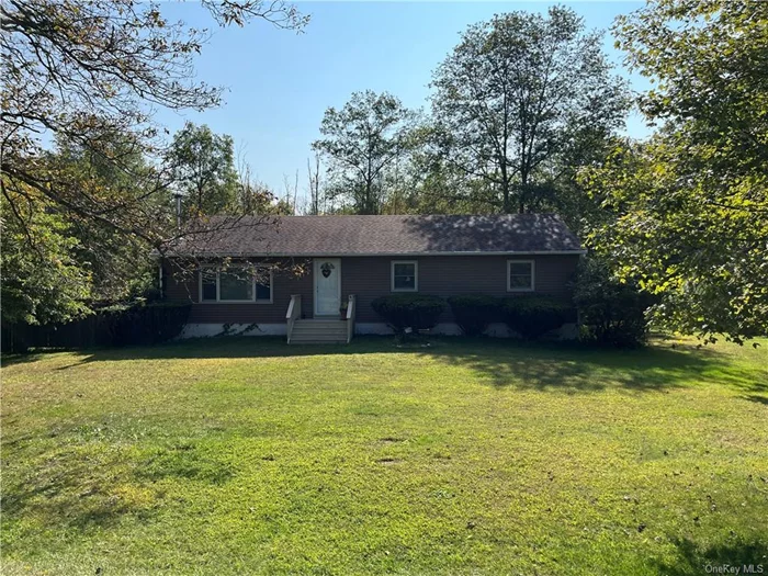 Don&rsquo;t let this charming ranch home in the Pine Bush School District pass you by! With its hardwood floors and an inviting open layout combining the living room, dining room, and kitchen, entertaining is a breeze. This home features three comfortable bedrooms, including a master bedroom with a half bath and a spacious walk-in closet. Stay snug during the winter months with the cozy woodstove. Recent updates include newer roof and windows that are just 10 years old, plus a freshly serviced boiler and septic system. Relax on the deck with your favorite drink and enjoy the serene, private backyard. This home offers comfort, convenience, and tranquility. It&rsquo;s also situated in a prime commuter location, you&rsquo;ll benefit from easy access to major routes .... come see it today!