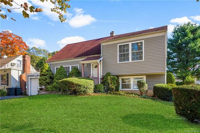 Nestled on tree-lined streets at the cusp of North East Yonkers & Colonial Heights, this delightful split-level home combines modern comfort with charm. 3 spacious bedrooms, 1 full & 2 half renovated bathrooms, spacious living/ dining area & renovated kitchen, creating a warm and welcoming atmosphere. The lower level offers a versatile recreation space, ideal for a home office, playroom, or cozy media area. Enjoy outdoor living in the spacious, level yard perfect for play, parties, gardening, or relaxing cup of morning coffee. With a driveway and a one-car garage, convenience is at your fingertips. This prime location places you just moments away from shopping, restaurants, and major highways, with easy access to NYC. Don&rsquo;t miss the opportunity to make this charming home your own!