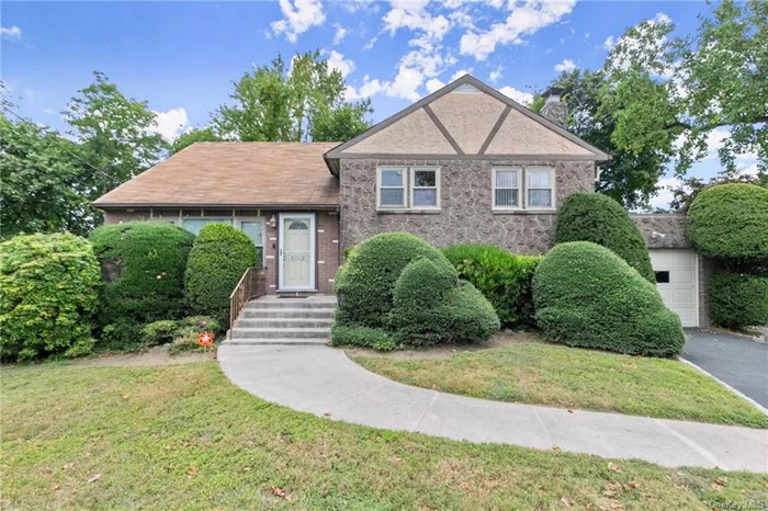 Make this Split Level home your Own! Enter this warm and welcoming home thru the large open entryway that leads to spacious living room with beautiful Bay window that brings in tons of light and high ceilings. The dining area leads to large eat-in-kitchen. Step up to three spacious bedrooms and full hall bath. Step up to a large bedroom. Step down to recreation room with fireplace, high ceilings , full bath, large laundry room with cabinets and door to closed in Sunroom which has a door to the Patio. Beautiful level fenced in property. One car attached and driveway parking. Close to school and shopping