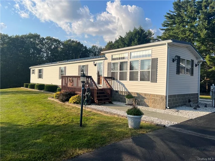 Experience the tranquility of country living in this immaculate mobile home nestled on over 5 acres of pristine, level land. The master suite boasts a luxurious standup shower and soaking tub, while the second bedroom and full bath provide ample space for guests or family. The large kitchen with abundant windows invites natural light to fill the space, creating a warm and inviting atmosphere. Central air and a whole house generator ensure comfort and convenience year-round. Outside, a detached one car garage with heat and electric, a shed, and a paved driveway offer storage and ample parking space. Located near the charming town of Narrowsburg, New York and the picturesque Delaware River, this property is a peaceful retreat that offers both serenity and convenience. Don&rsquo;t miss the opportunity to make this your own private sanctuary.