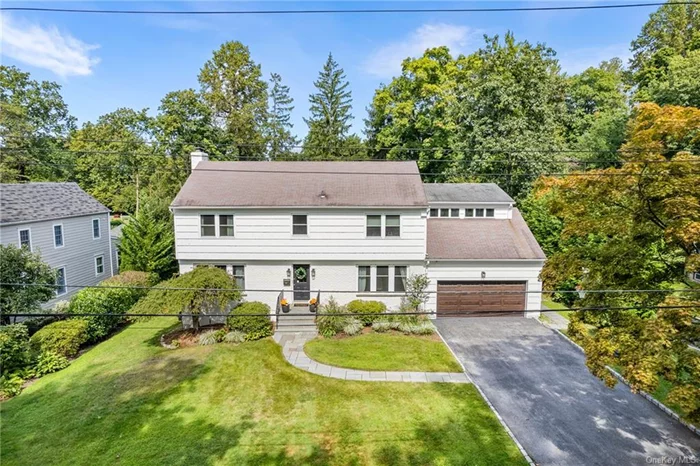 Welcome to this beautiful Gedney Farms colonial! This spacious and inviting home boasts a large open gourmet kitchen with a spacious dining area and a wall of windows that floods the space with light. Enjoy cozy evenings by the wood-burning fireplace in the living room, or gather in the great room around the gas fireplace. The hardwood floors add elegance throughout, while the ideal deck and outdoor kitchen are perfect for entertaining and backyard barbecues, it&rsquo;s the ideal place to create lasting memories. Situated on a level lot, this property includes a Tesla charger for added convenience. The property includes a French drain from Connecticut Basement Systems. Located close to the Hutchinson River Parkway and just minutes from downtown White Plains, you&rsquo;ll have easy access to shopping, award-winning restaurants, and vibrant nightlife. Come experience the warmth and charm for yourself!