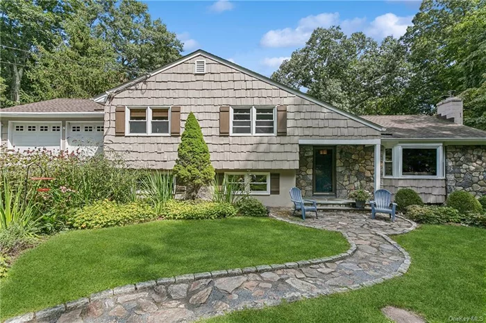 Perennial gardens and lush landscaping combine with custom stone steps to show off this home&rsquo;s curb appeal. Nestled on a 2-acre lot on a cul-de-sac. Welcoming entry leads to a bright living room with glistening hardwood floors and a fireplace insert that offers an additional heat source. Dining room has French doors to a large deck. Eat-in kitchen includes gas cooking and generous pantry space. Upstairs has 3 wonderful bedrooms and 2 full baths. Large Primary bedroom has a new bath with custom features. Downstairs family room features surround sound, gas fireplace, custom built bookcases, and a home office overlooking the scenic backyard. Laundry room has adjacent storage space. Generator hook-up enables appliances to function during power loss. Basement offers a large, dry storage space. The recently painted exterior has many wonderful features...extensive custom stone work, vegetable garden, Bluestone patio, and room for play and relaxing. Close to Metro-North train, shopping and Ward Pound Ridge Reservation.