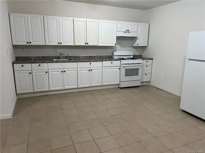 This two bedroom apartment is ready for occupancy!! very well insulated apartments, Spacious Sunny Rooms through out- All tiled flooring, a newer kitchen & a newer bathroom, walk to downtown shops, eateries, shopping outlets, minutes to highways!!! Tenant pays for all utilities.