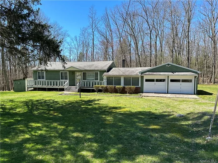 Welcome to your dream rural retreat! This charming 3-bedroom, 1-bathroom ranch-style home is nestled on nearly 2 acres of private woods, providing the perfect backdrop for serene living.Step inside to discover a spacious family room, complete with a cozy wood stove, perfect for those chilly evenings. The home features a delightful back 3-season porch adorned with skylights, allowing you to bask in the beauty of nature year-round, whether it&rsquo;s enjoying a sunny afternoon or watching the leaves change in the fall. The oversized 2-car garage provides plenty of storage for your vehicles and outdoor equipment, making this property as functional as it is picturesque. With a little creativity and personal touch, this home is ready for your finishing touches, allowing you to create the perfect sanctuary tailored to your style. Embrace the tranquility of rural living while still being close to modern conveniences this property is a rare find that won&rsquo;t last long! GPS address is Sparrow Bush.