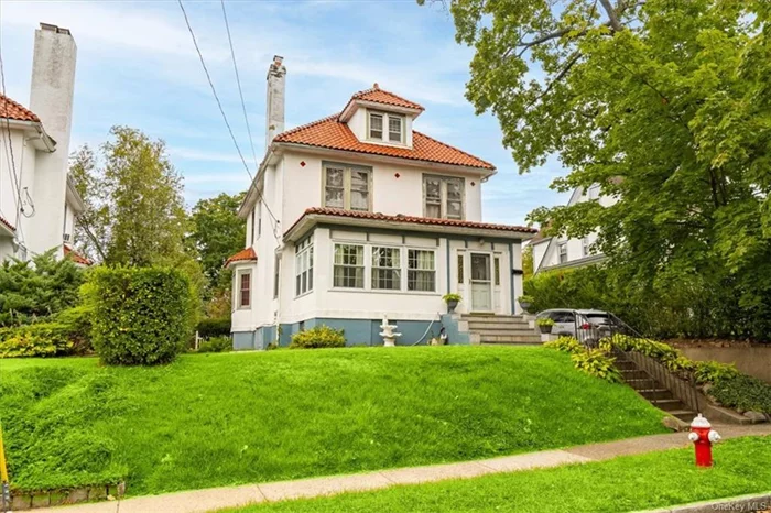 Stunning Dutch Colonial home with ample space for the entire family. This residence boasts both front and rear sun porches, a living room with a brick fireplace wuth original moantle, and numerous built-in features. The formal dining room and foyer are enhanced by elegant stained glass windows. The modern kitchen is equipped with granite countertops and stainless steel appliances. The one-car garage offers additional space for bikes, motorcycles, recreational vehicles, and storage. Enjoy entertaining in the expansive backyard, which also has room for a flower or vegetable garden. Conveniently located within walking distance to both Pelham and Mount Vernon East Metro-North stations, offering a 25-minute commute to NYC.