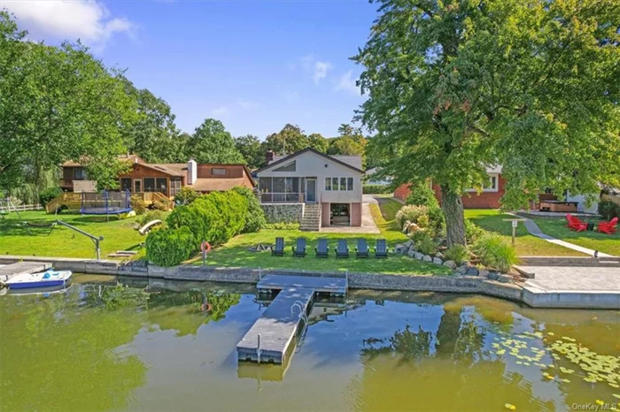 Perched lakefront on the east arm of Greenwood Lake, this newly updated 50&rsquo;s style home offers waterfront living at its best. Go boating from your private dock or peacefully kayak and paddleboard in the no wake zone that spans this area of the lake. The spacious screened in sunroom with lake and mountain views extends the living and entertaining space and is the perfect place for morning coffee or catching the brilliant sunsets that are synonymous with the east shore. Currently operating as a successful short-term rental with a proven track record, the property is being offered with the option of being fully furnished and outfitted with everything needed to run a high revenue rental. Updated systems, new septic tank and immaculate condition ensure a smooth hosting experience. Just an hour drive from NYC, the Greenwood Lake area has become a hot spot for hospitality, affording owners the opportunity to have a lake house that can use themselves as well as have rental income.