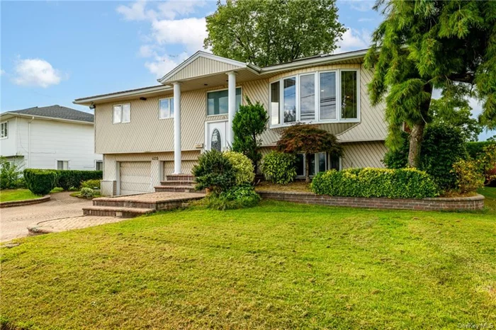 Welcome to 429 Bambrick st. a high ranch in the heart Ocean Harbor, Oceanside. This beautiful home features an eat-in kitchen, dining room, Living room with Radiant heat, 3 bedrooms and 2 full bathrooms all on the top floor. The bottom floor is tiled and features an office/ Gym / additional sleeping space, a small bar, a utility room, a washer and dryer, a double car garage, that can be easily converted for additional bedrooms as well as slider doors to your own backyard Oasis with a swimming pool and a multi-level XL deck where you can entertain, grill and enjoy the elements. The driveway is large enough to fit 4 cars. 70x100 lot. This location is amazing with the Oceanside LIRR and the Margie street park just a few steps away and Trader Joes, Costco, Stop and Shop and many more shopping and eating options just minutes away, all in the quiet and peaceful setting of Ocean Harbor.