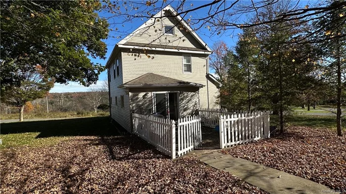 Charming 2 1/2 Story Home on over 5 Acres in Liberty, NY! Nestled on over 5 private acres, this lovely 2.5 story home offers endless potential. The spacious property includes a picturesque side meadow and an additional meadow across the street, providing both privacy and stunning views. A detached garage with an upstairs bonus room is waiting to be transformed into the perfect rec room or workspace! There is an eat-in kitchen as well as a dining room features sliding glass doors that open onto a patio, ideal for relaxing evenings, BBQs, and entertaining guests. The backyard is the perfect spot to unwind after a long day.  Stay cozy during the winter months with cast iron baseboard heating, while solar panels and upgraded electric keep energy costs in check. Both the house and garage have brand new roofs, ensuring peace of mind for years to come. The additional half-story is a versatile space ideal for a playroom, office, or craft room. With so many possibilities, you can truly make this home your own. Easy to NYS Route 17 / I-86. Less than 2 hrs. to NYC. Liberty, being the center of the county makes this an easy drive to medical, Bethel Woods Center for the Performing Arts, Resorts World Casino, Kartrite Water Park, Shopping, breweries, hiking, boating and all of Sullivan Counties natural resources.  Bring your vision and make it shine! This one is not to be missed!