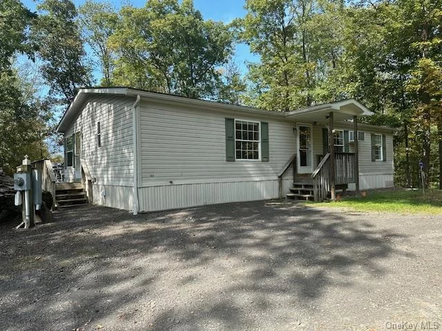 Welcome to this beautiful and scenic modular home, located in Olivebridge NY! This single-family home is a great opportunity as it has been well maintained. Current owner has owned this home for 13 years. This home consists of 1 master bedroom with master bathroom, and 2 regular sized bedrooms with 1 regular sized bathroom (3 bed and 2 bath total). There is laundry hookup and an outside shed as well. Sitting on 1.7 acres, this home is surrounded by beautiful mountain views, rock formations, and trees. There is a front deck and rear patio so you can enjoy the special views while entertaining guests! The land has ample room for campfires, outdoor retreats, and further landscaping if desired. You cannot go wrong with this opportunity as it provides the country living, while also being close to neighboring city towns like Kingston NY. Whether looking for the right property to be your weekend retreat/getaway, or your year-round home with country views, call this property your home today!