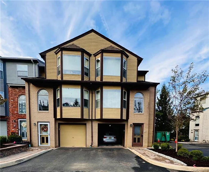 LOCATION LOCATION! Close to public transportation and commuter train/bus, this fantastic End-Unit Townhome is a rare find! Located in The Hamlets of Rockland and currently used as a 2BR+, this home offers bright, open and spacious living. Unique and open architectural design with Skylights and half-levels separating all living space. Bright, open Foyer entry with the finished Family Room on first level, Large Kitchen/Dining, with Sliders to Private Deck, and the Spacious Living Room & Powder Room are located on the main floor while the Main Bedroom, Main Bath, additional Den/Office area are on the Upper Level. Recent Updates Include: Hardwood Flooring throughout most of the home, Updated Bathrooms & Kitchen Appliances. HOA Fees include Water, sewer, trash pick-up, and all exterior common property maintenance.