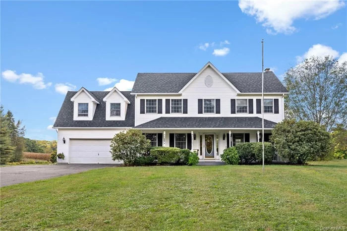 Sitting on 2+ acres and bordering corn fields, this 4 bedroom, 2.5 bath colonial offers the perfect balance of country life and modern convenience, located only minutes from town. WALLKILL SCHOOLS, with over 2, 300 square feet of comfortable living space. This home features beautiful hardwood floors, central air, and a freshly painted interior. On the main floor, you will love the amount of natural light that floods the living room, formal dining room, and the spacious kitchen. A half bathroom and sitting room complete the lower level. Upstairs, you will LOVE not carrying laundry up and down the stairs, as the laundry room is located on the same floor as all 4 bedrooms. Including the primary suite, complete with oversized bathtub AND a shower! Enjoy summer days in the swimming pool, or evenings on the deck while taking in the serene farmland views. 2 car garage for the cars or toys, with full unfinished basement and attic for additional storage capabilities.