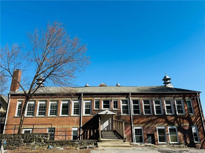 Multiple-used building in the city of Middletown OR2 zoning. 7000 sqft per floor. Total 3 stories with 40 parking space. Theproperty includes space in the rear of the building that has been used for parking up to another 40 cars. This brick facade is in decent shape and the entire space can be re-fitted for potential limited business uses (private school, dare care, pre-school, church are allowed in the zoning). Current used are two residential units on the top floor. Each unit is 5 bedrooms 3 bathrooms. There is -7000 sqft. on both the middle floors and the first floor. It is good for per-school or church usage.