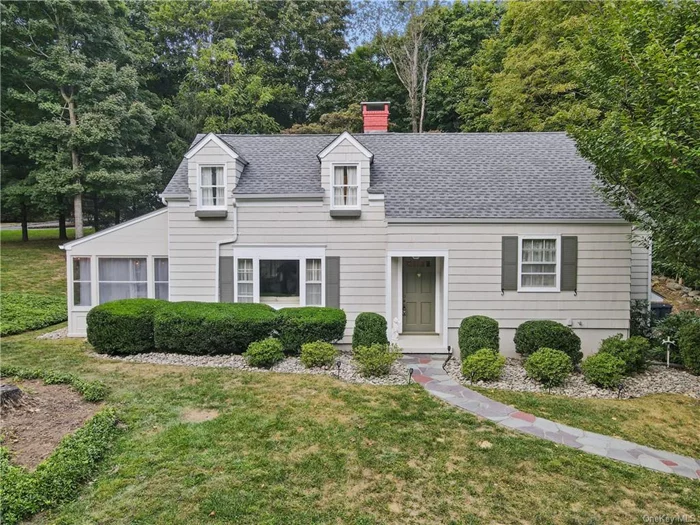 Charming Cape Cod in the Heart of Katonah Village! Delightful 3 BR, 2 Bath Cape nestled on over half an acre of picturesque, usable land. With 1, 472 sq ft of living space, this home offers a blend of character & modern updates. The walk-out lower level is partially finished offering add&rsquo;l square footage, perfect for a home office, playroom, or entertainment space. Key features incl. a newer roof & clapboard siding. The fenced-in deck & screened-in porch overlook a beautifully manicured yard, offering endless outdoor enjoyment. The primary BR suite provides a private retreat, while the galley kitchen boasts granite countertops, a farmhouse sink, stainless steel appliances, and a beverage bar. Just a short stroll to the charming Hamlet of Katonah, you&rsquo;ll enjoy convenient access to boutique shops, restaurants, & the train station for an easy commute to NYC. Nearby the elementary school & Town Park, w/ pool, tennis courts, paddle courts, & playground. A Katonah gem move right in & enjoy!