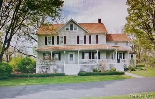 Welcome to this charming 1900s farmhouse, situated on 10.4 acres and featuring a storage shed, two barns, and a small pond that completes the picturesque property. One barn is used as a garage, while the other offers eight stalls, a tack room, and both barns include second-story storage. The house boasts 5 bedrooms and 1.5 bathrooms, with hardwood floors throughout. Additional features include a water softener with a chlorine injection system, updated electrical work, an updated kitchen, and a fully replaced roof with new attic framing. The property is bordered by a rock wall, and a lawn tractor is included.