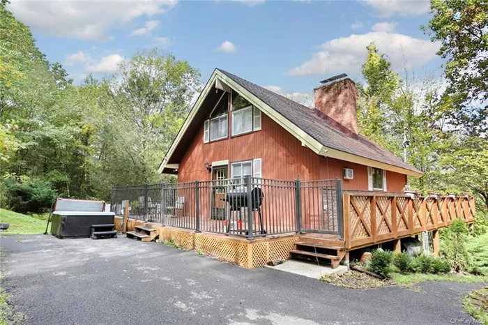 A-Frame home in the town of Wallkill within the Minisink School District. The home is nestled amidst 1.2 acres of serene woodland and offers lots of natural lighting, vaulted ceilings, along with charm and privacy. A large wrap-around deck hugs the perimeter of the home, providing ample space for outdoor relaxation, entertaining, and soaking in the sights and sounds of nature. Inside enjoy the rustic beauty with breathtaking views of the floor-to-ceiling windows. The updated kitchen and bath in 2023 give it a modern touch. Other modern conveniences are smart thermostats and well water filtration system. A three season sun room with floor to ceiling windows adds to the charm of this house along with a bedroom on the main floor. Heading upstairs to the primary bedroom, you&rsquo;ll discover exposed wooden beams providing a comfortable and relaxing space. On the bottom level you will find a living area with an additional fireplace. A bedroom on the lower level, laundry area and walk-out provides a perfect private space. Outside, explore with winding paths leading through the woods and opportunities for outdoor recreation with the above ground pool just steps from your door and a shed that provides your outdoor storage. Potential for purchase of the furniture. In addition, the property is currently being used as a successful AirBnB providing extra income. Schedule your showing today!