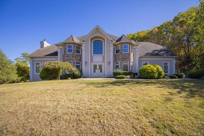 Don&rsquo;t miss this opportunity to get into one of the most desirable neighborhood in Stony Ridge Estates. Walk into this custom stucco & stone colonial with two story entry & wrought iron staircase. Spectacular great room with 22 foot ceilings and floor to ceiling stone fireplace & custom mantel. All the bells & whistles compliment this magnificent kitchen. Stainless steel appliances, 6 burner Wolf stove, wall oven, Sub Zero refrigerator, built-in wine fridge & vegetable sink in center island. Hardwood floors in formal living room, dining room, and 1st floor guest quarters. Ensuite bedroom has sitting room with double sided gas fireplace and 2 walk-in closets. Custom bath has walk in steam shower, bidet, Jacuzzi tub and make up vanity. Three additional large bedrooms, full bath with walk in shower and laundry room complete second floor. All bedrooms have hardwood flooring. Full walkout basement waiting to be finished with 12 foot ceilings, fireplace & bathroom plumbing. UPDATED decking, and driveway. Enjoy hiking, 7 Lakes, marinas, and golf. Close to Palisades Parkway and only 45 min to Manhattan.